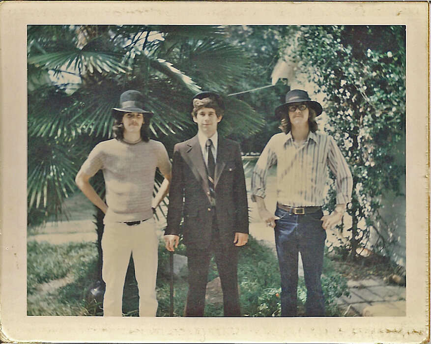 Daniel, Michael, and Robert Mooney on the patio at 600 Homestead Drive